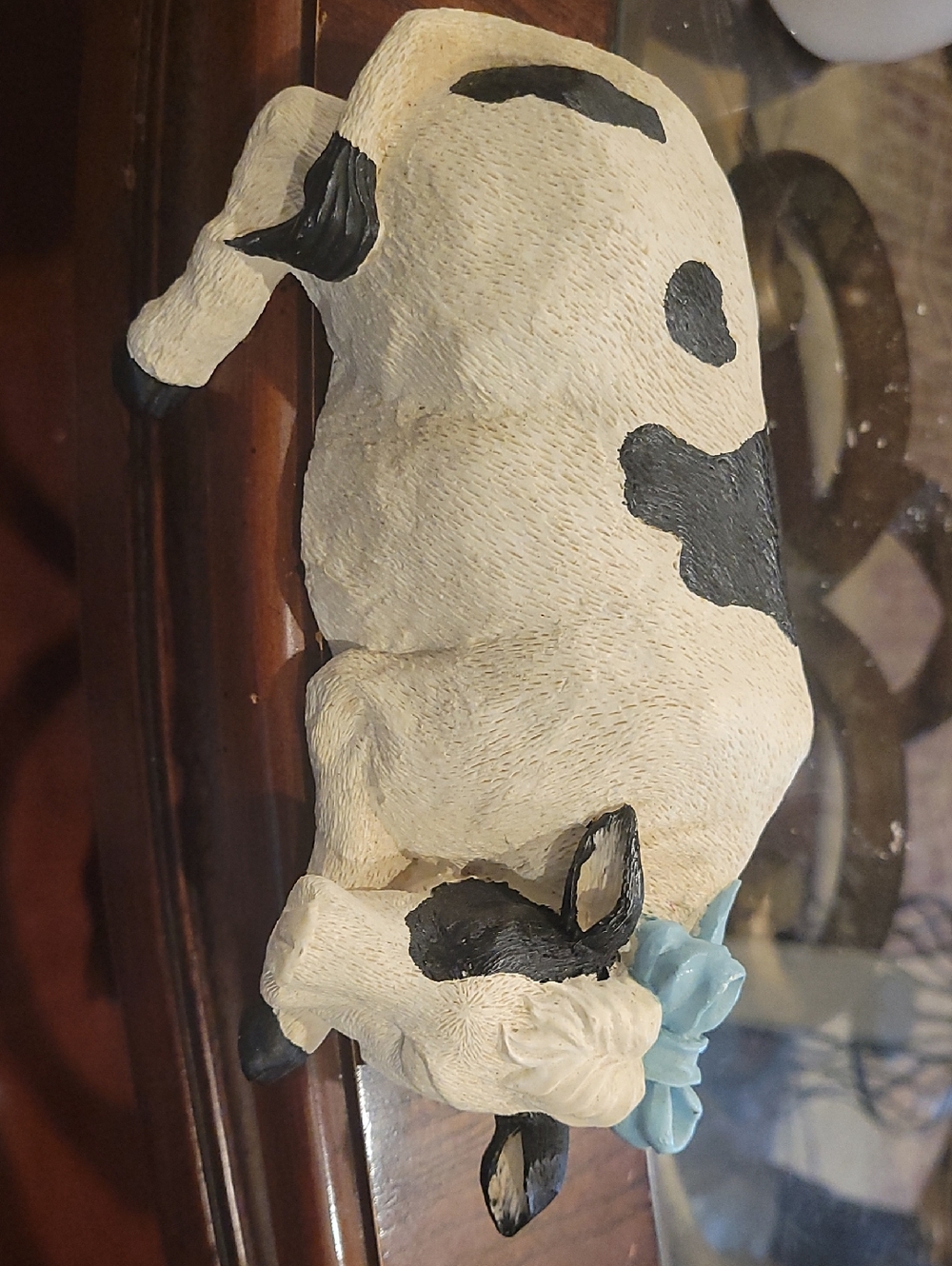 Cream and Black Cow Figurine with Blue Bow